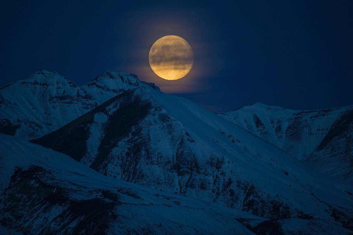 outdoors snow coated mountain at night time alaska