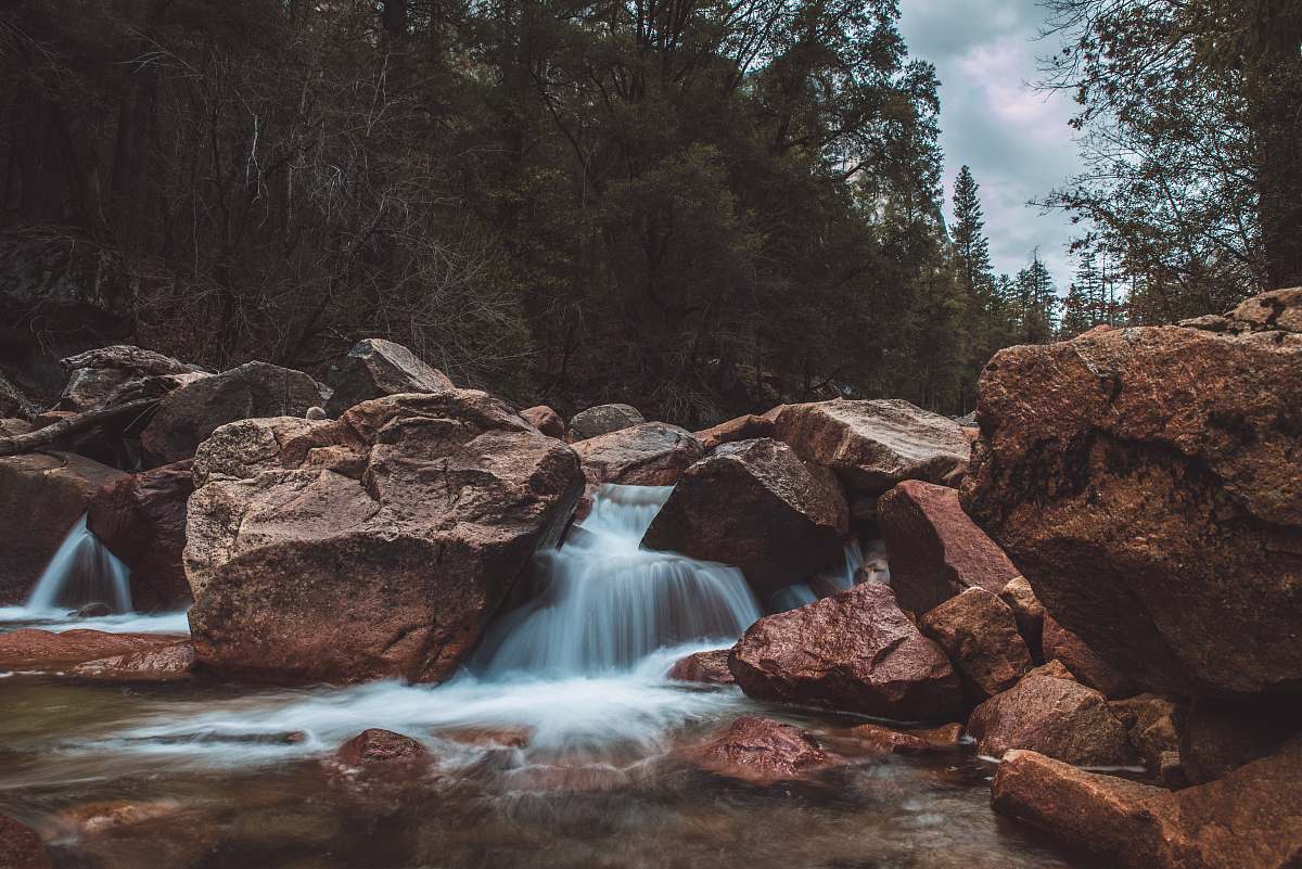 water water flowing on brown rocks river