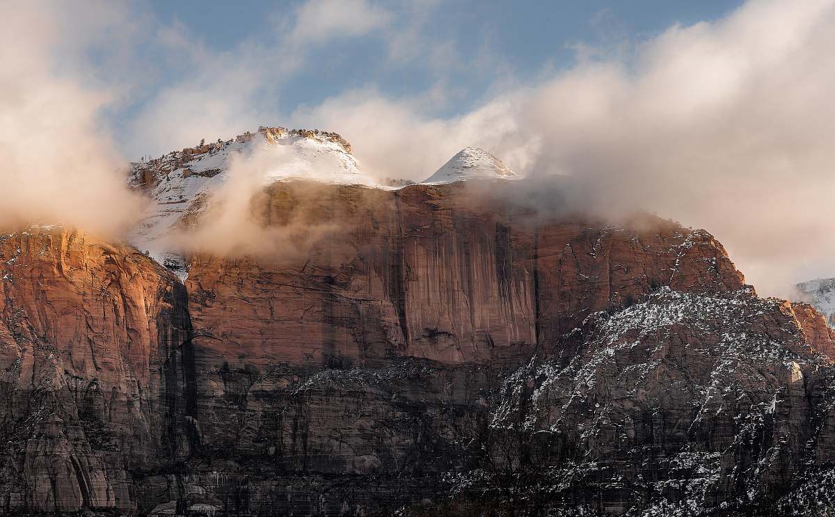 mountain white covered rock mountains under white sky zion national park