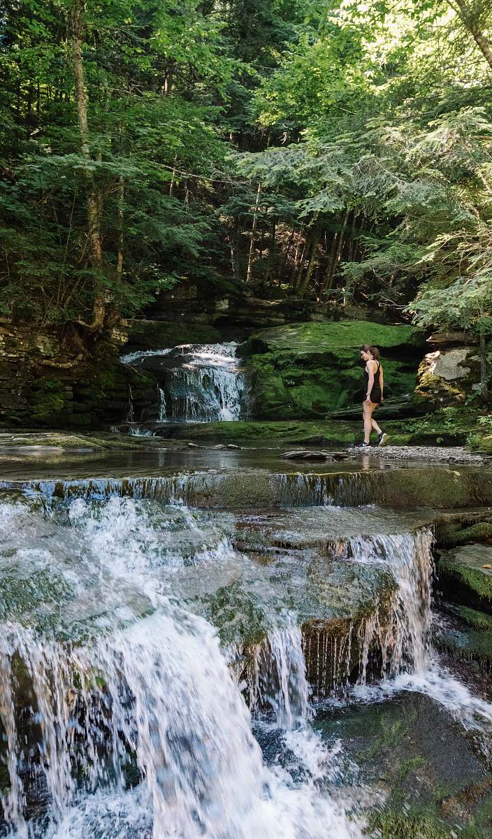 outdoors woman standing near body of water water