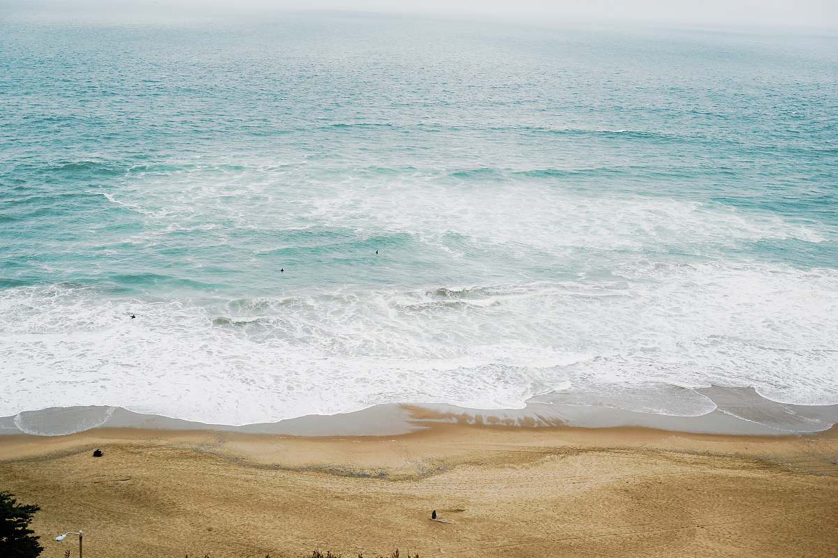 water calm ocean at daytime beach