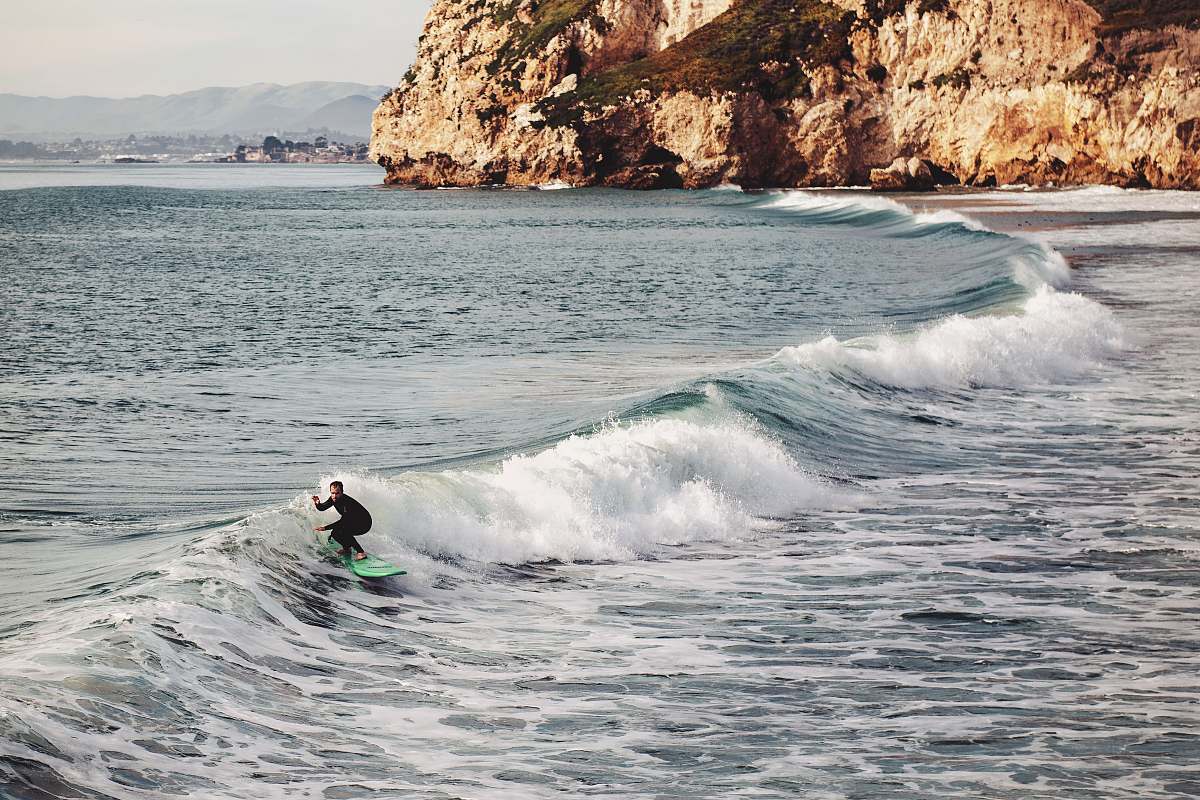 water man surfing on sea wave during daytime nature
