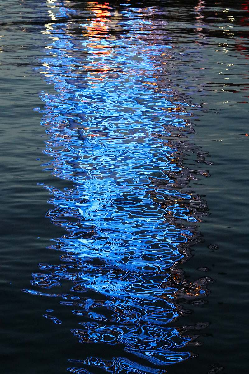 water blue and yellow light reflections ripple