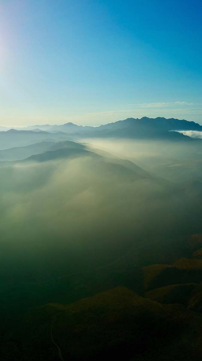 nature mountain covered i fog fog