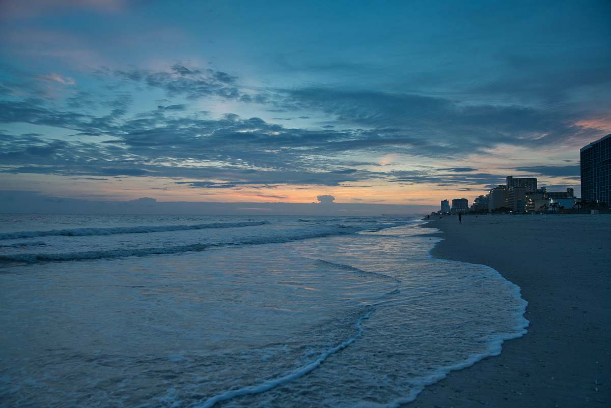 nature orange and blue sky at sunset over beach sea