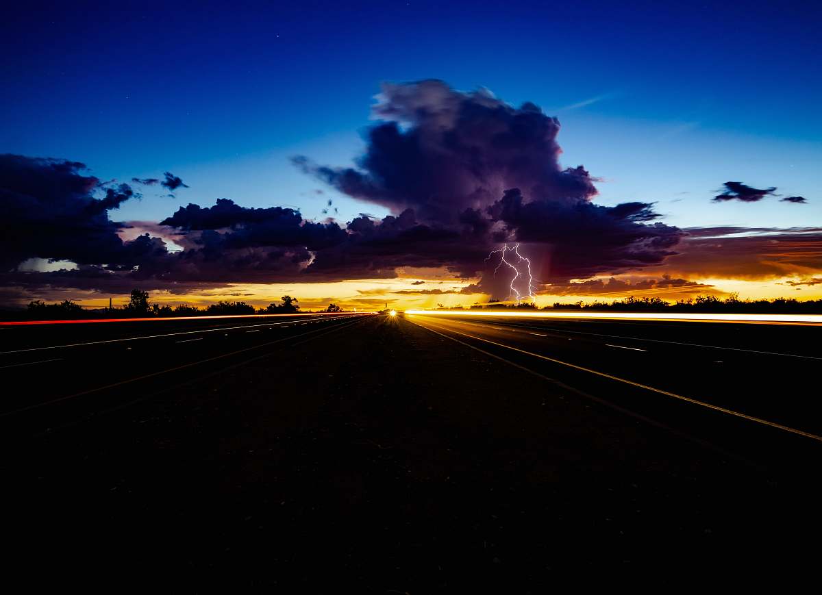 sky silhouette photo of road road
