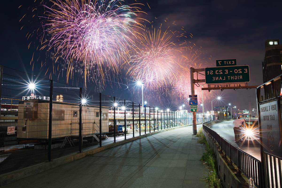 nature fireworks display over the building during night time outdoors