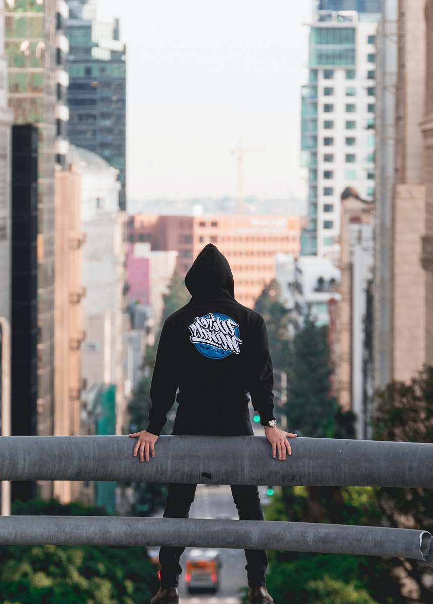 human ban standing on ledge person