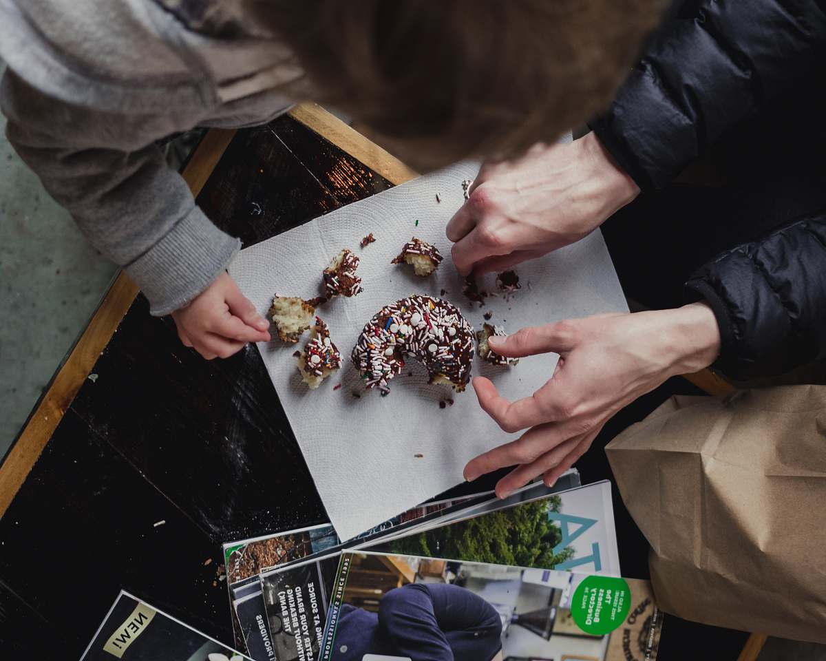 human man decorating the food on the plate person