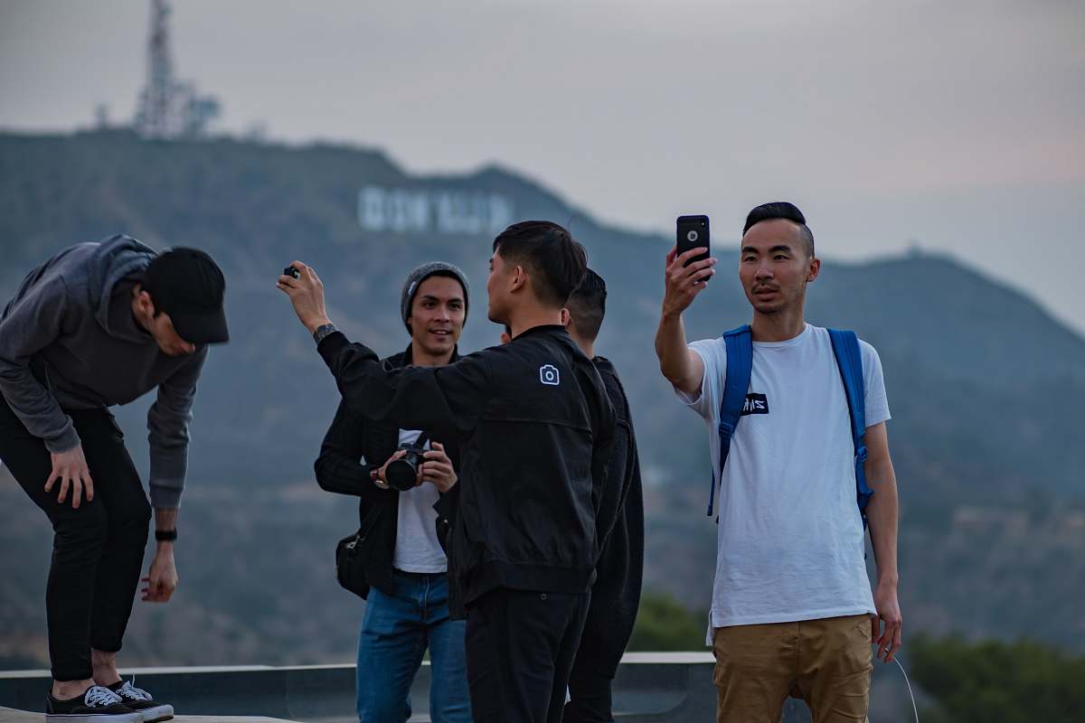 person people taking photo on building human