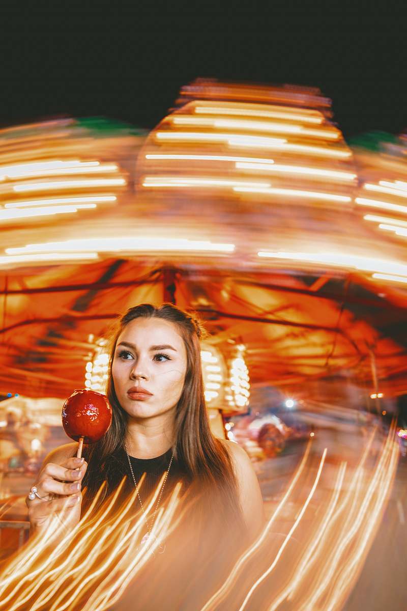human woman holding pomegranate candy person