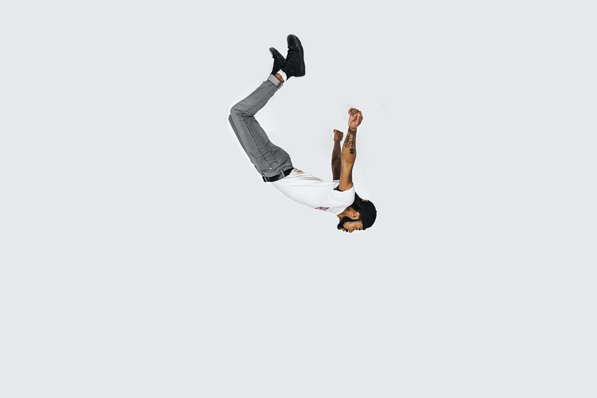 human man in white shirt and gray jeans people