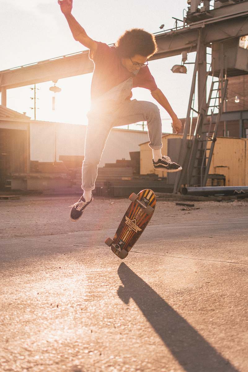 human man skate boarding during daytime skateboard