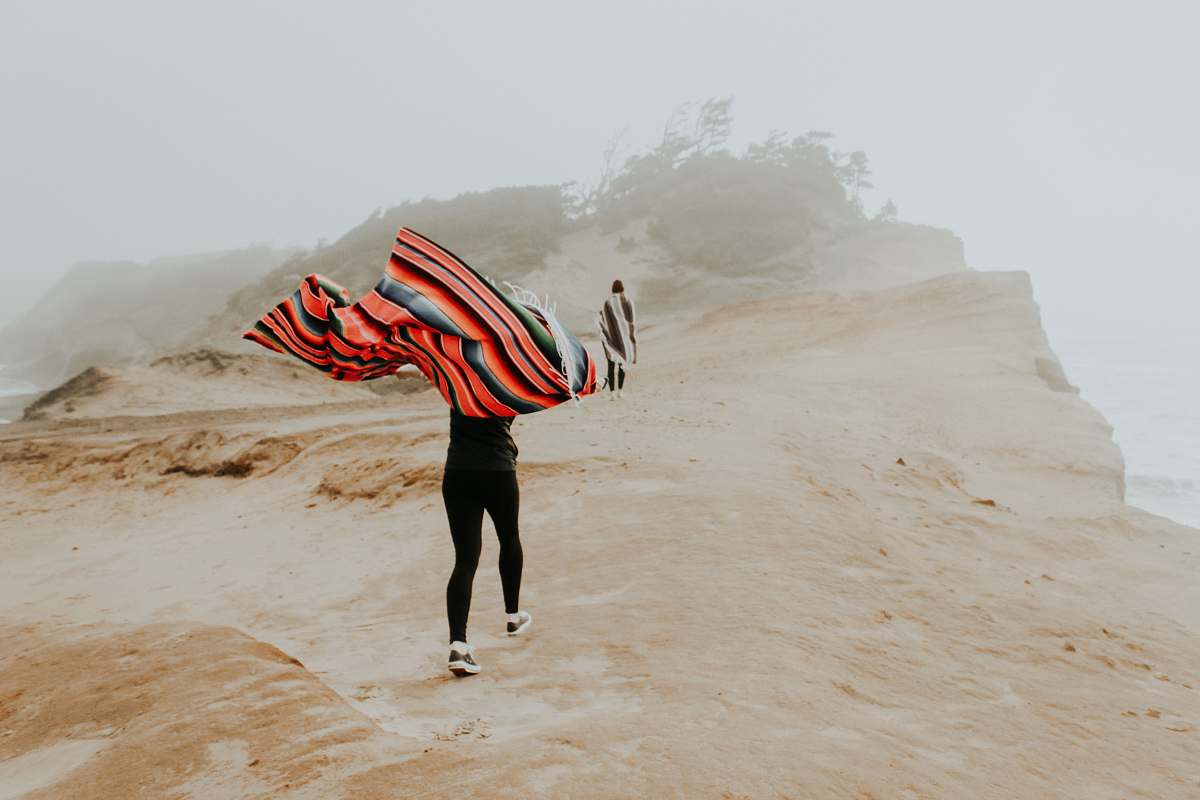 human person carrying shawl people