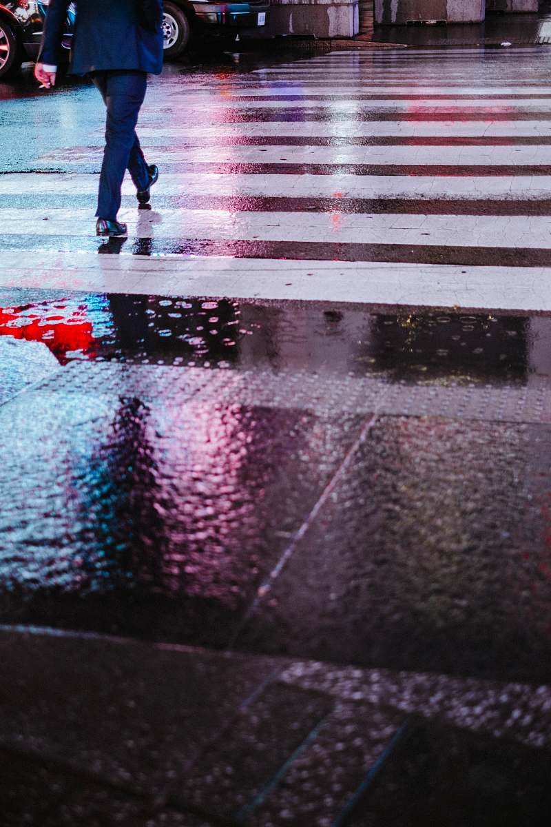 human person wearing suit jacket walking on pedestrian lane people