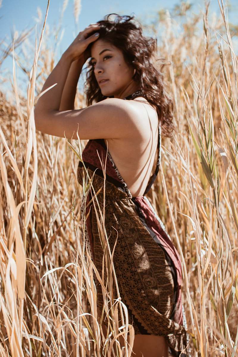 human woman standing on brown long grass field people