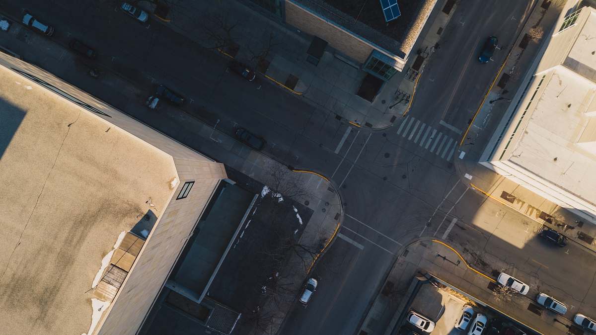 wood top angle photo of buildings taken at daytime aerial view