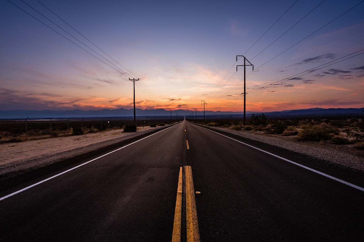 freeway empty road during golden hour death valley national park