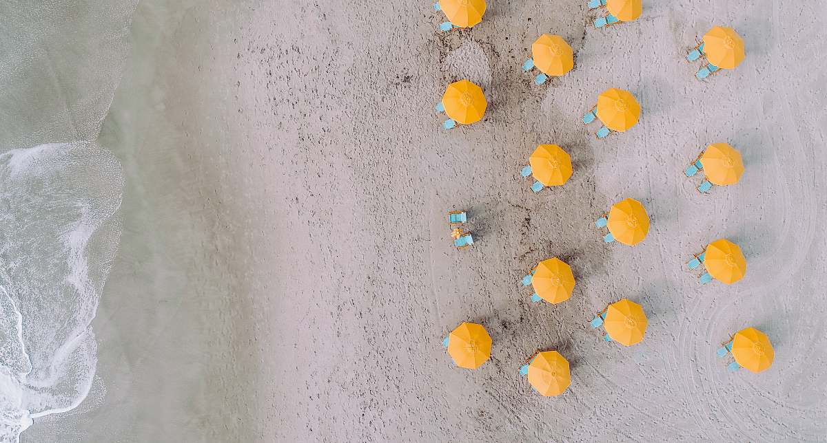 canopy yellow umbrellas on seashore umbrella