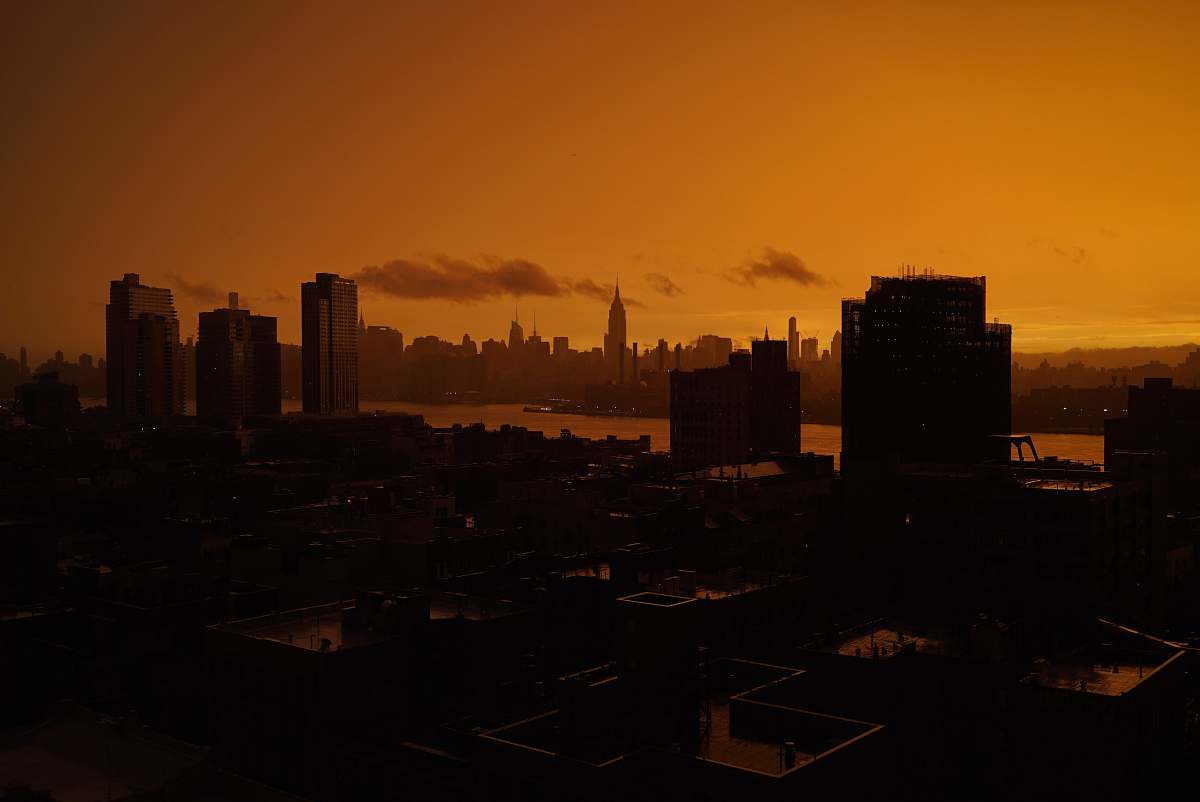 sunset aerial photography of buildings sunrise