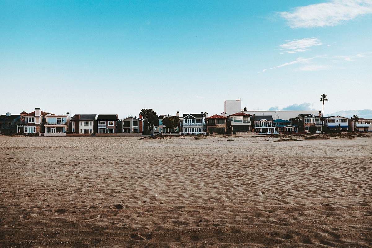 sand people walking on beach during daytime nature
