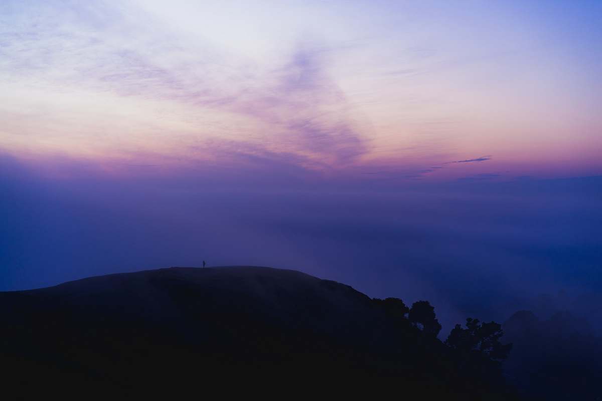 sunrise silhouette of mountain under purple sky dawn