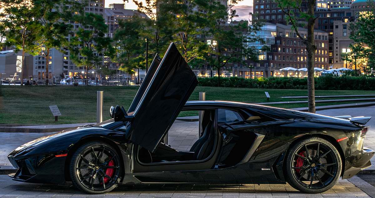 vehicle black super car automobile