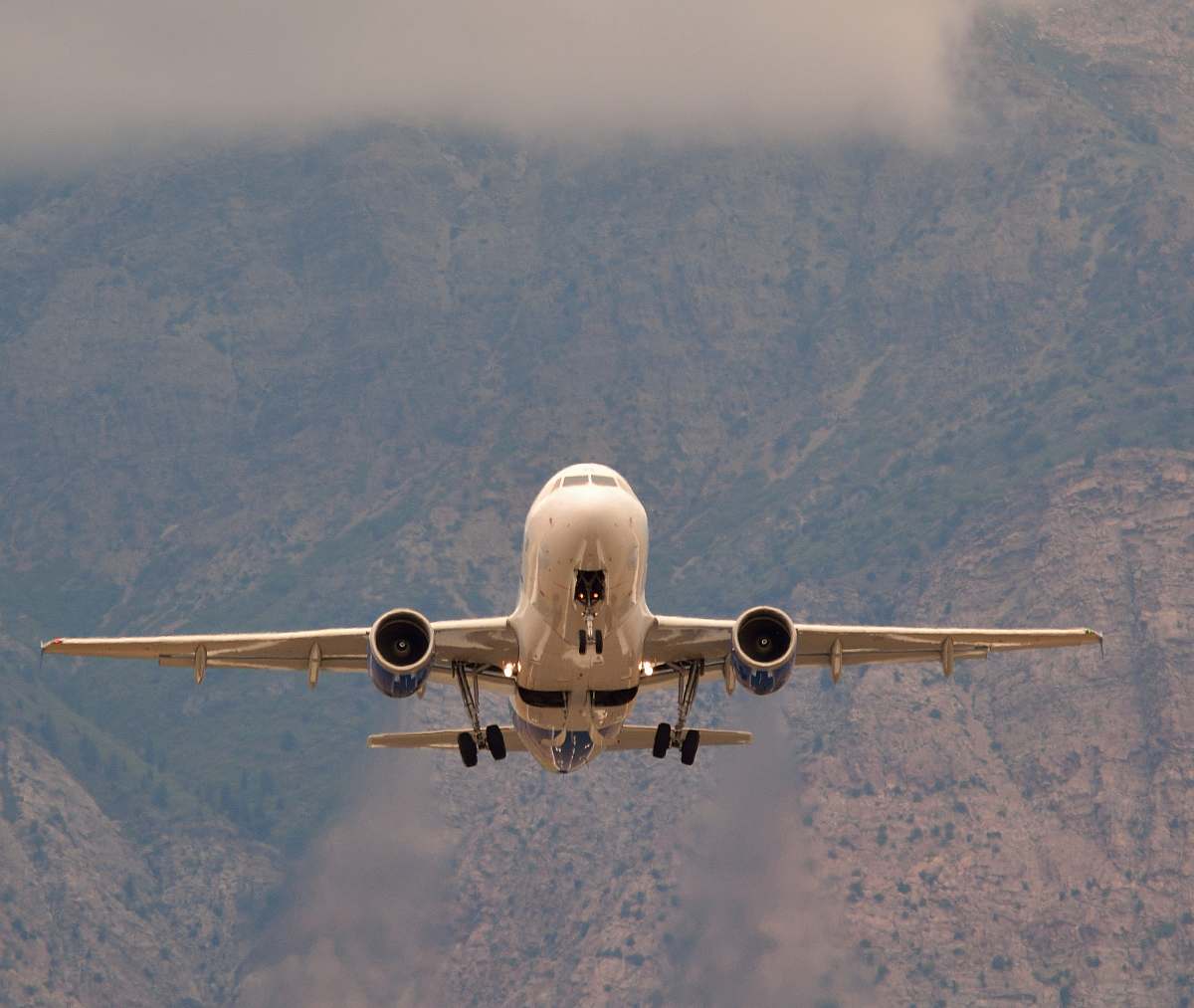 vehicle white airliner on flight during daytime aircraft