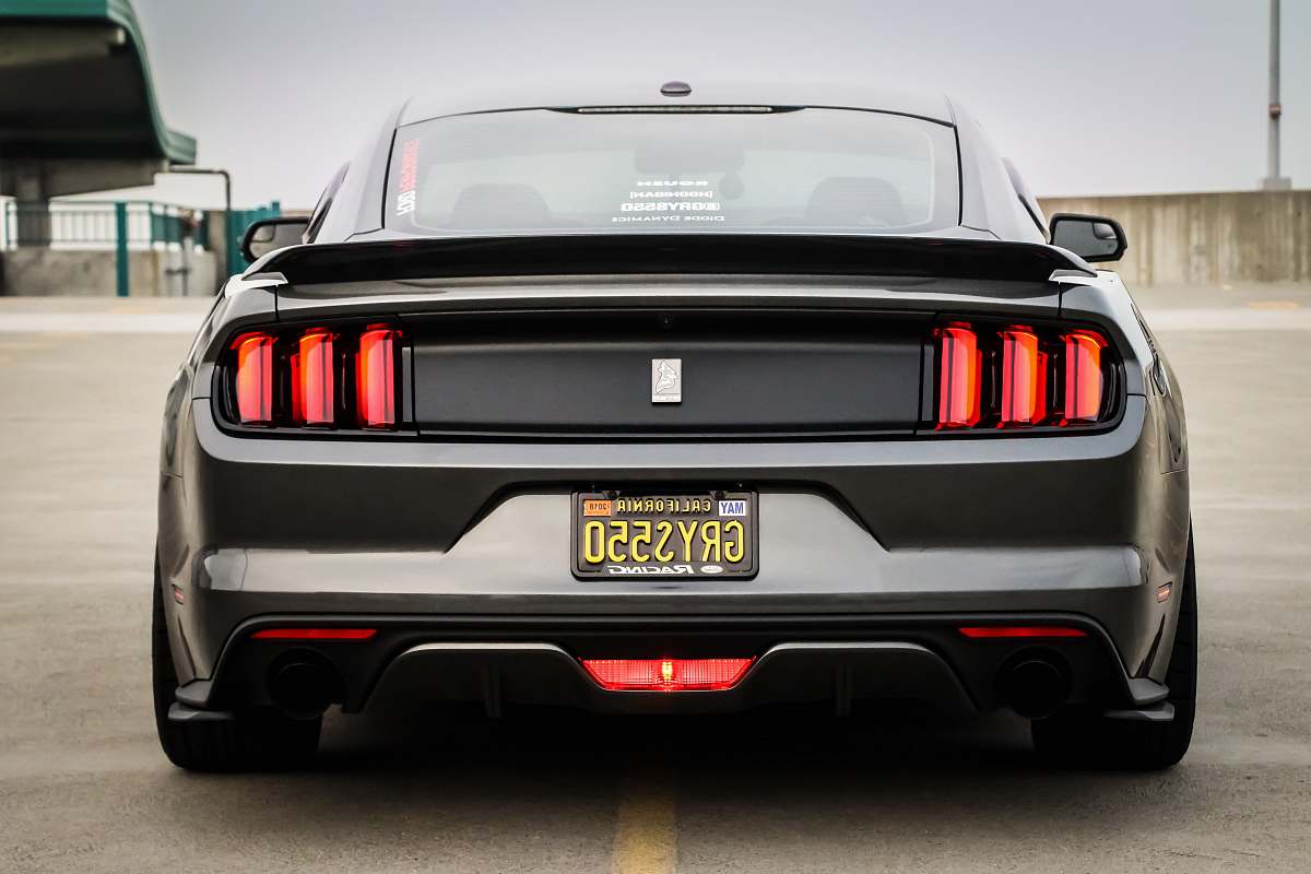 car black car on road sports car