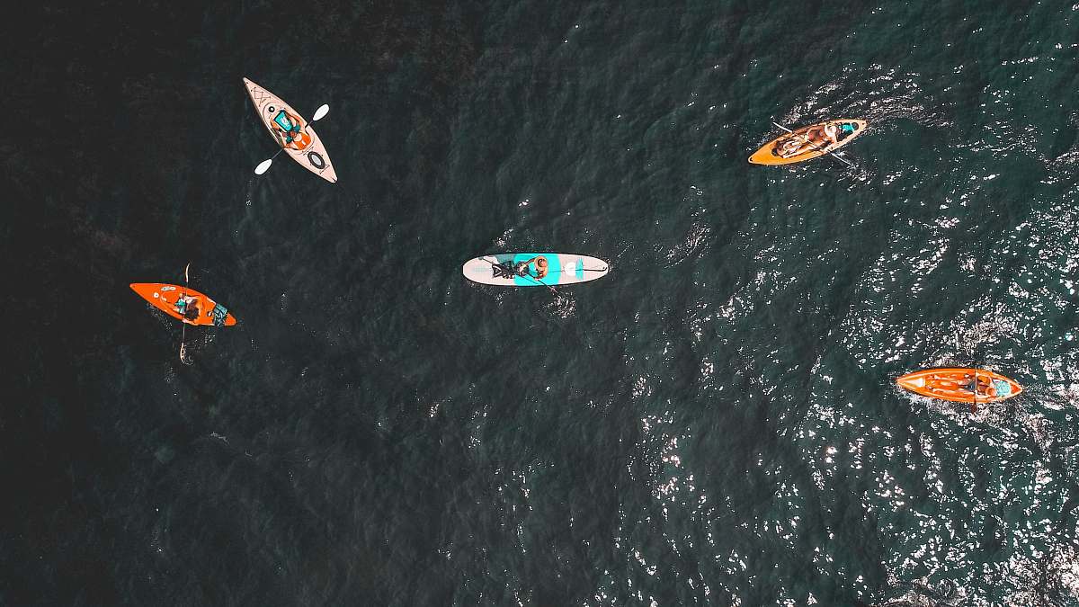 nature aerial people riding kayats ocean