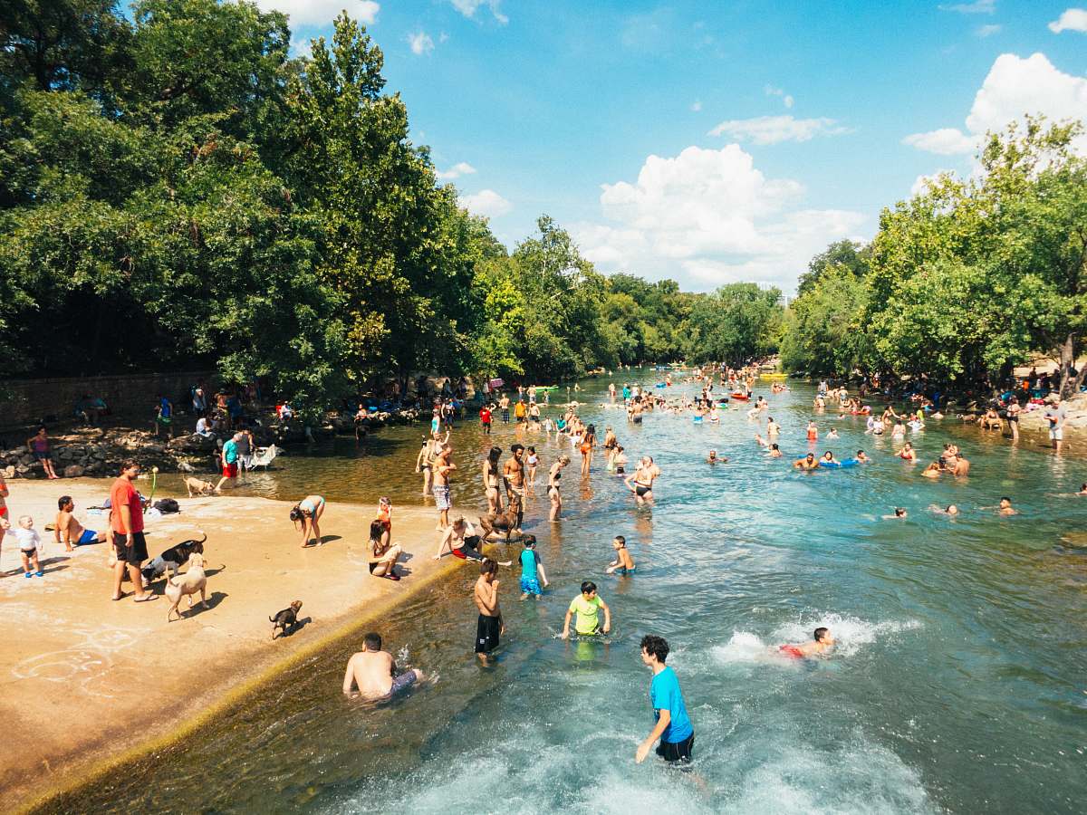 Outdoors Group Of People In Body Of Water During Daytime Austin Image ...