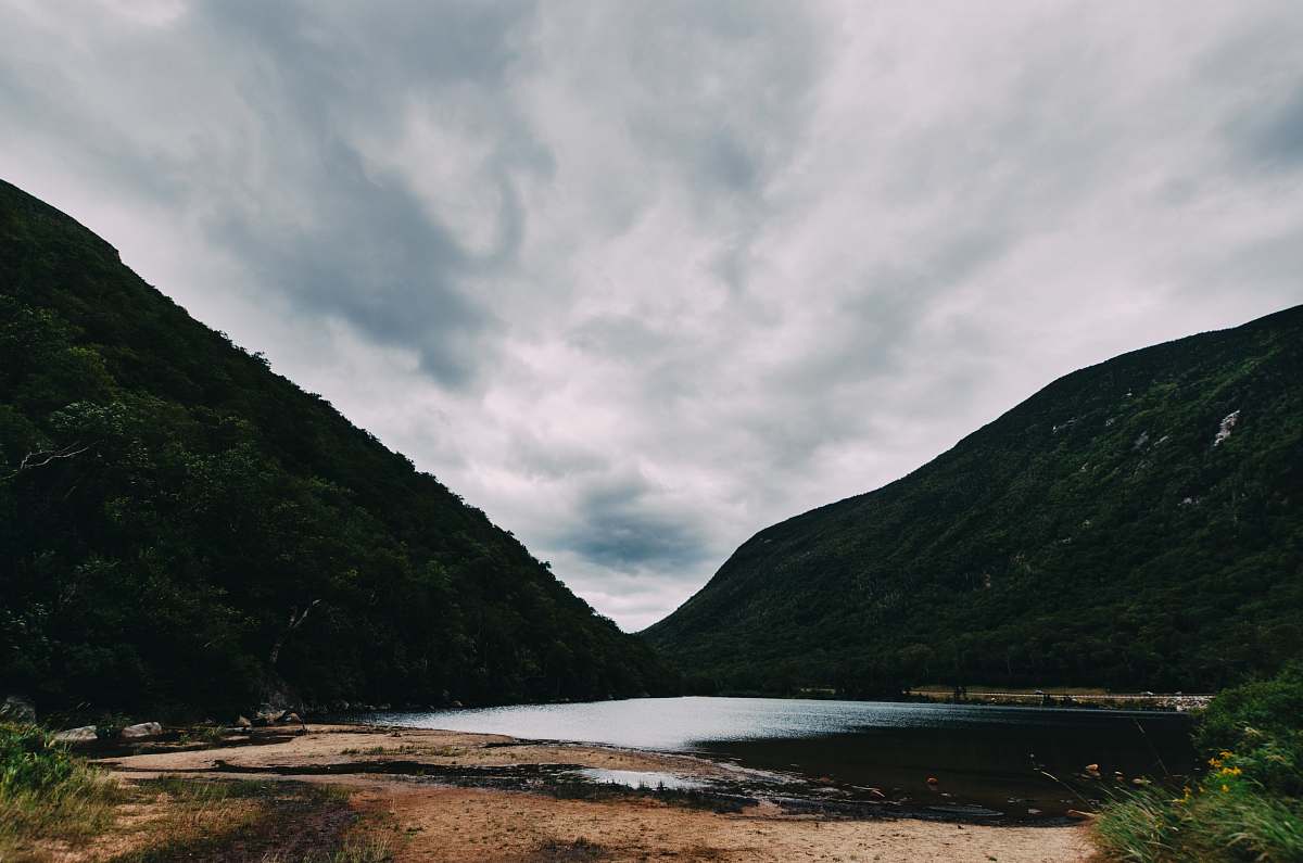 outdoors lake between mountain nature