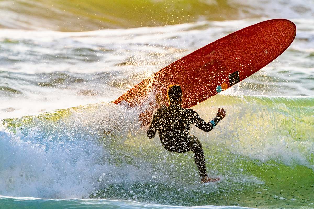 sea surfer bailing out on board sport