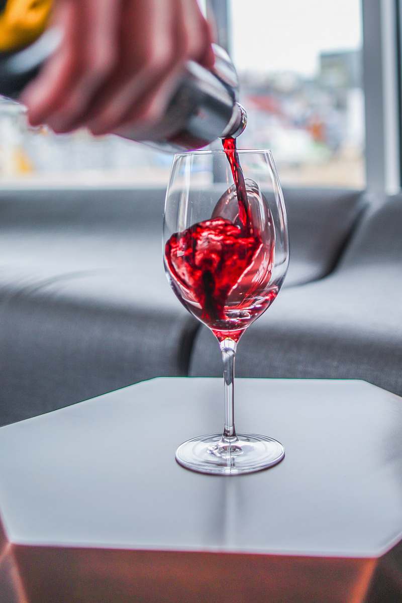 glass red wine in clear wine glass denver