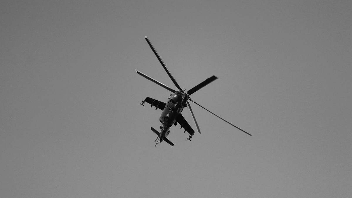 bird grayscale photography of flying helicopter black-and-white