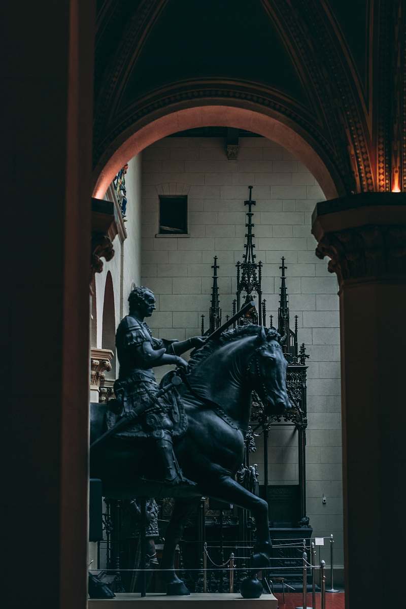 horse knight riding horse statue inside building mammal