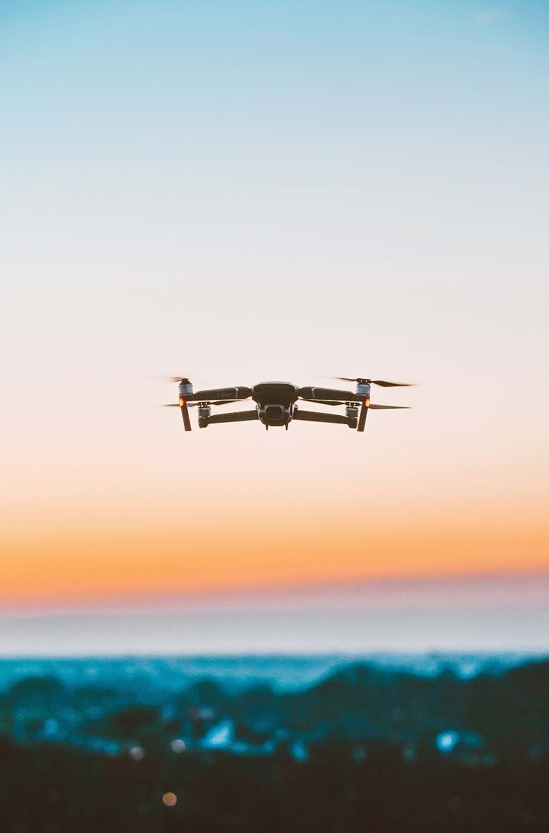 bird white camera drone during daytime flying