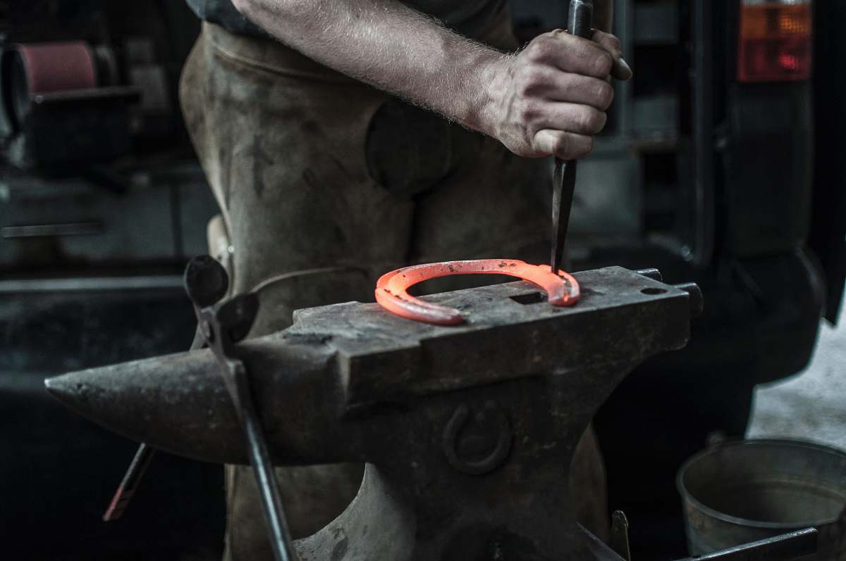 horseshoe man forging horseshoe blacksmith