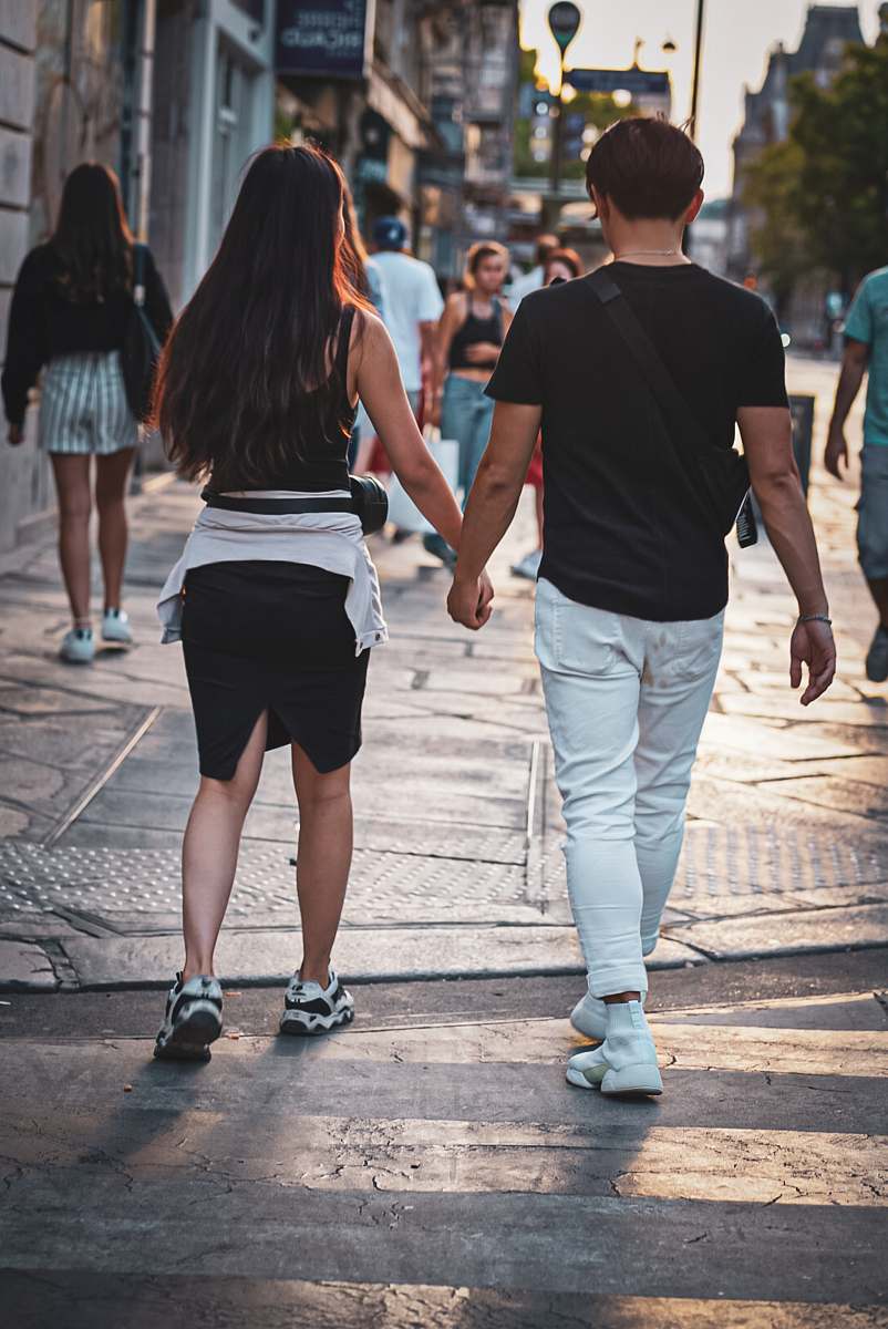 clothing couple walking on pedestrian lane shorts