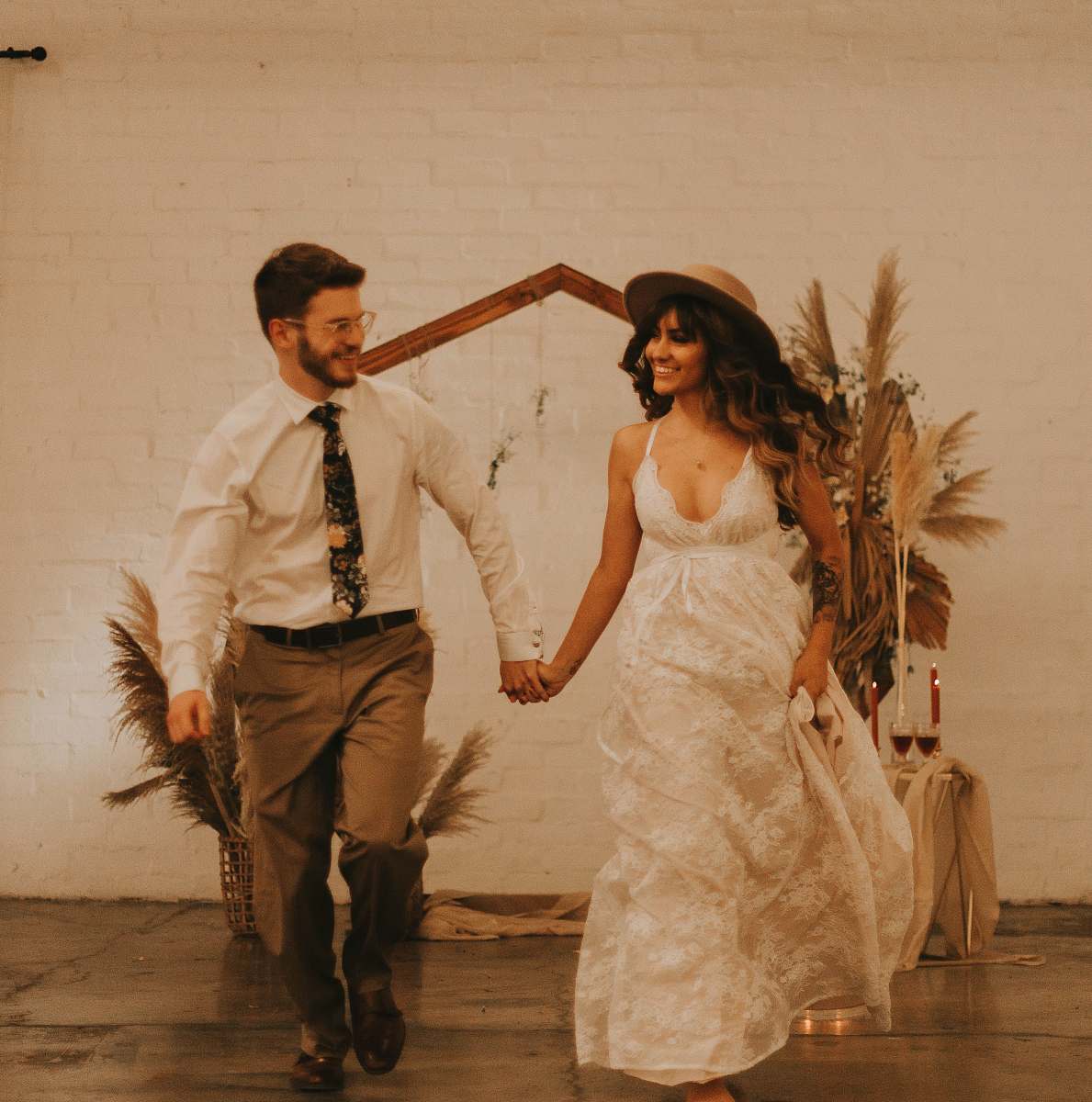 clothing newly wed couple walking and smiling dress