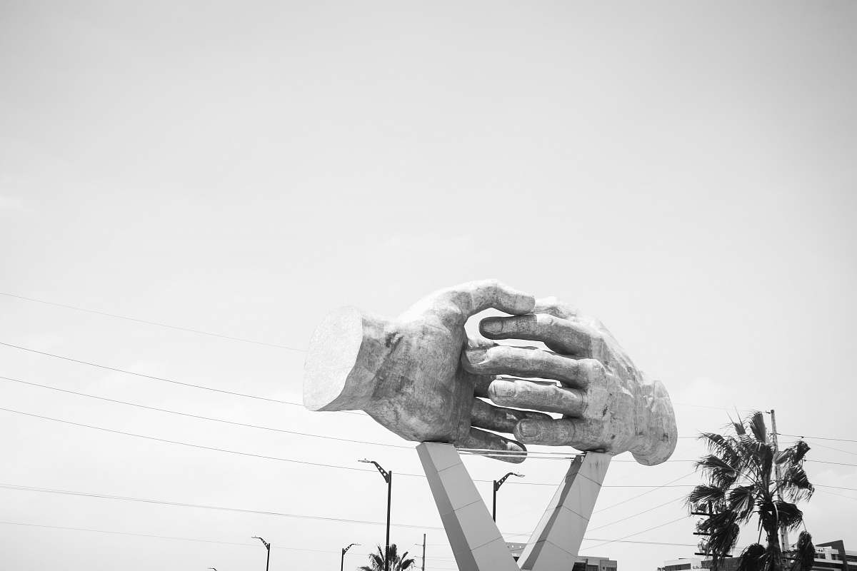 art grayscale photo of shaking hands statue drawing