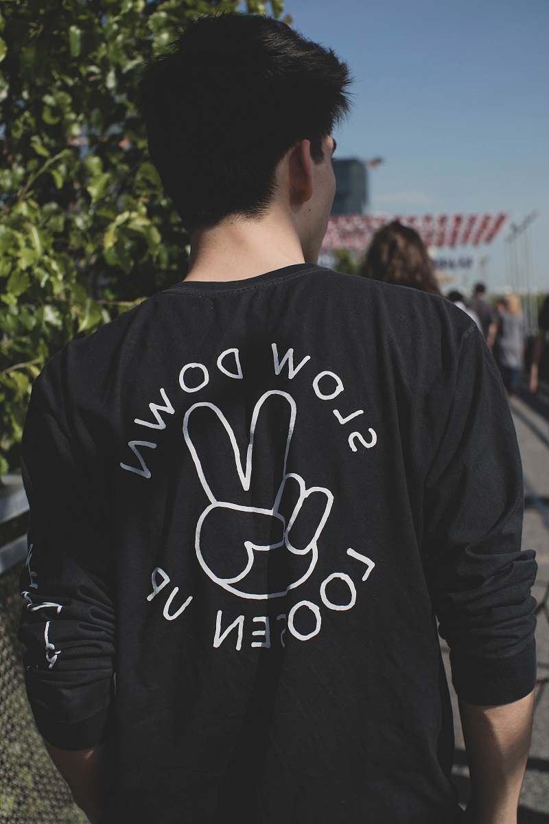 apparel man in black long-sleeved top sleeve