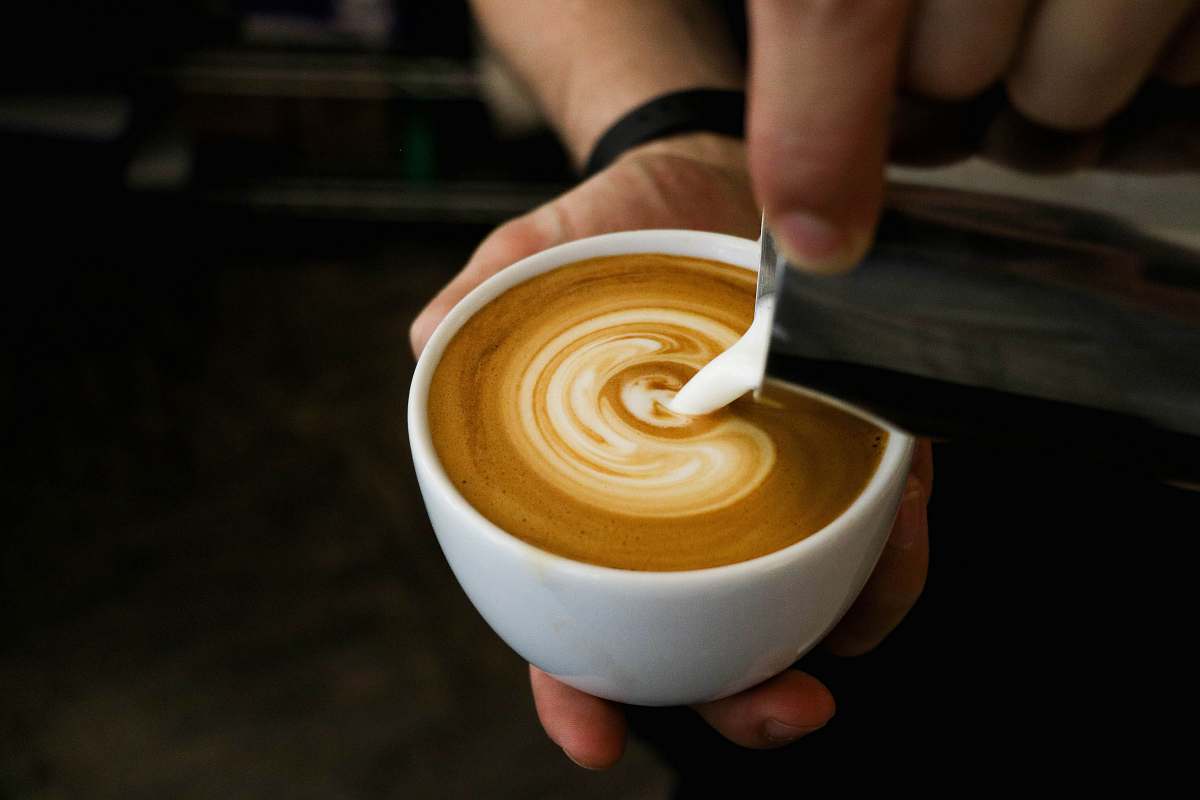 drink coffee in white ceramic container beverage