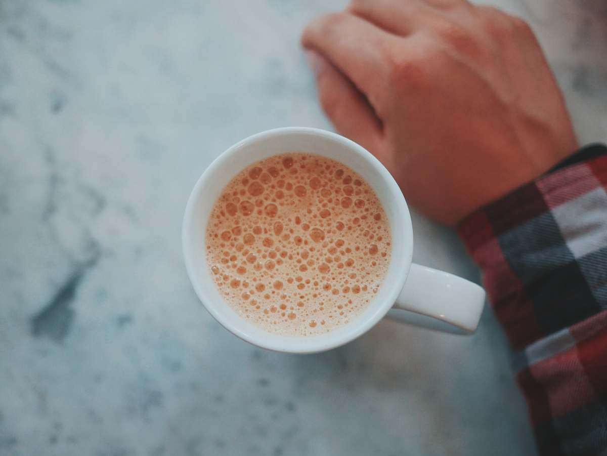 beverage mug with coffee in shallow focus drink