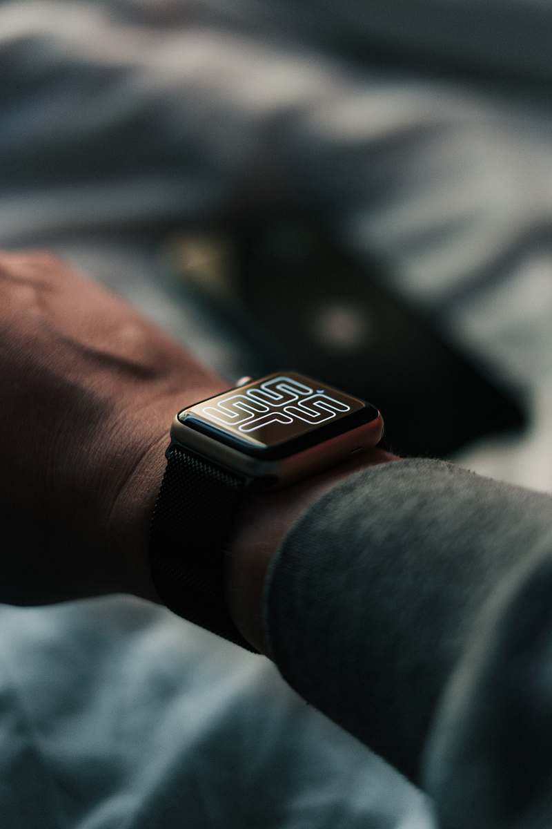 wristwatch smartwatch displaying 22:12 time camera