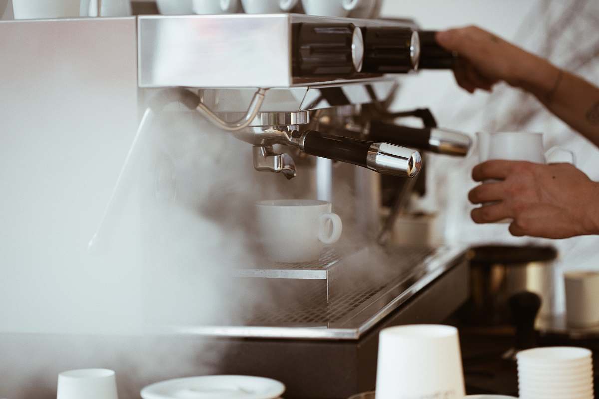 bratislava person holding white mug brewing coffee slovakia