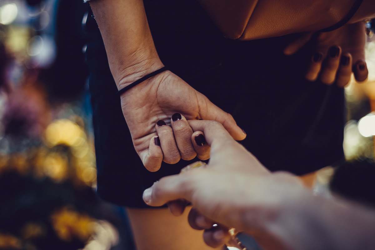 human woman holding hand person