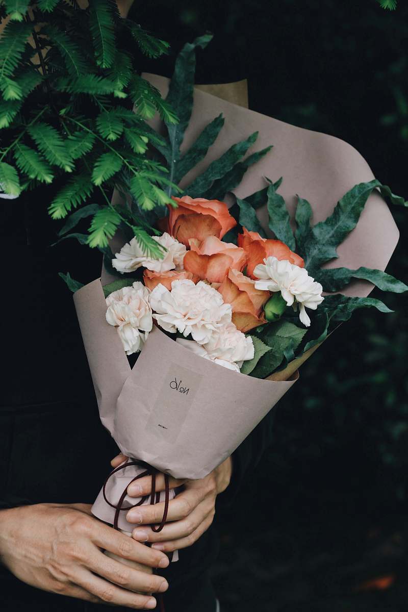 floral white and orange flower bouquet plant