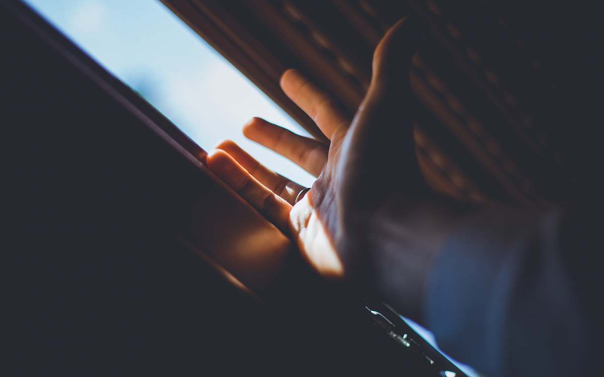 human black and red sports bike finger