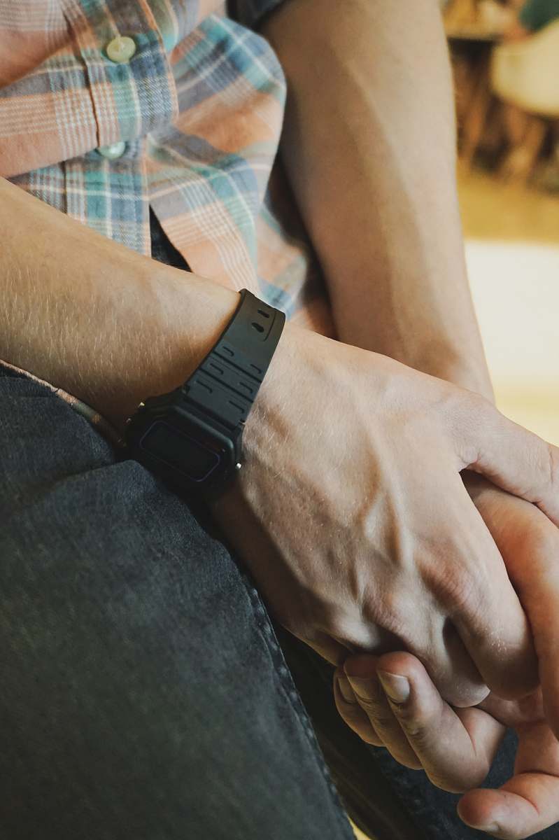 person black digital watch with black straps human